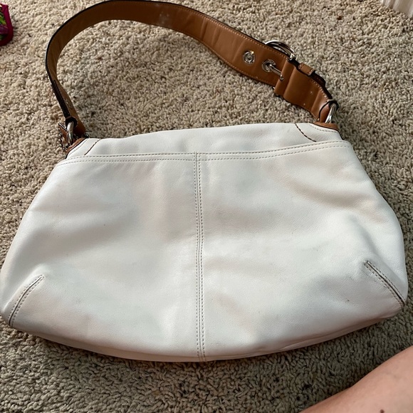 White Coach purse. A few small stains/scuffs on it. Still good condition - Picture 2 of 3